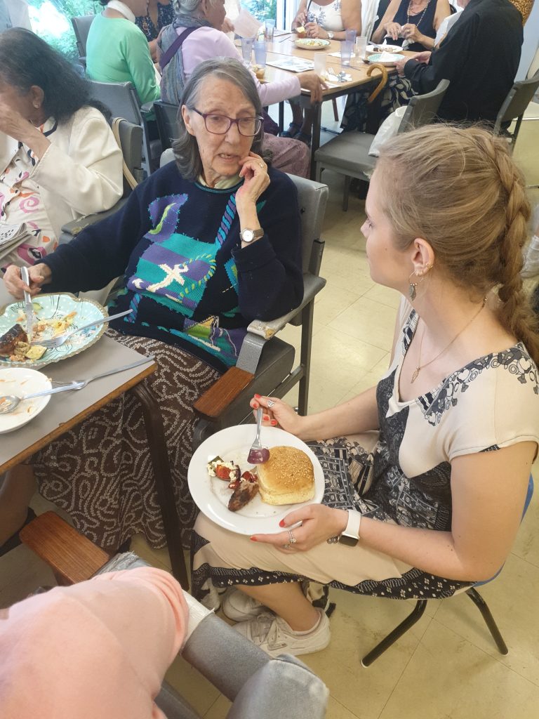 rewardStyle volunteers chatting to Millman Street Members at our BBQ